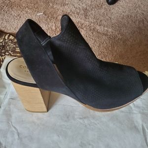 A black suede sling back Sandals.